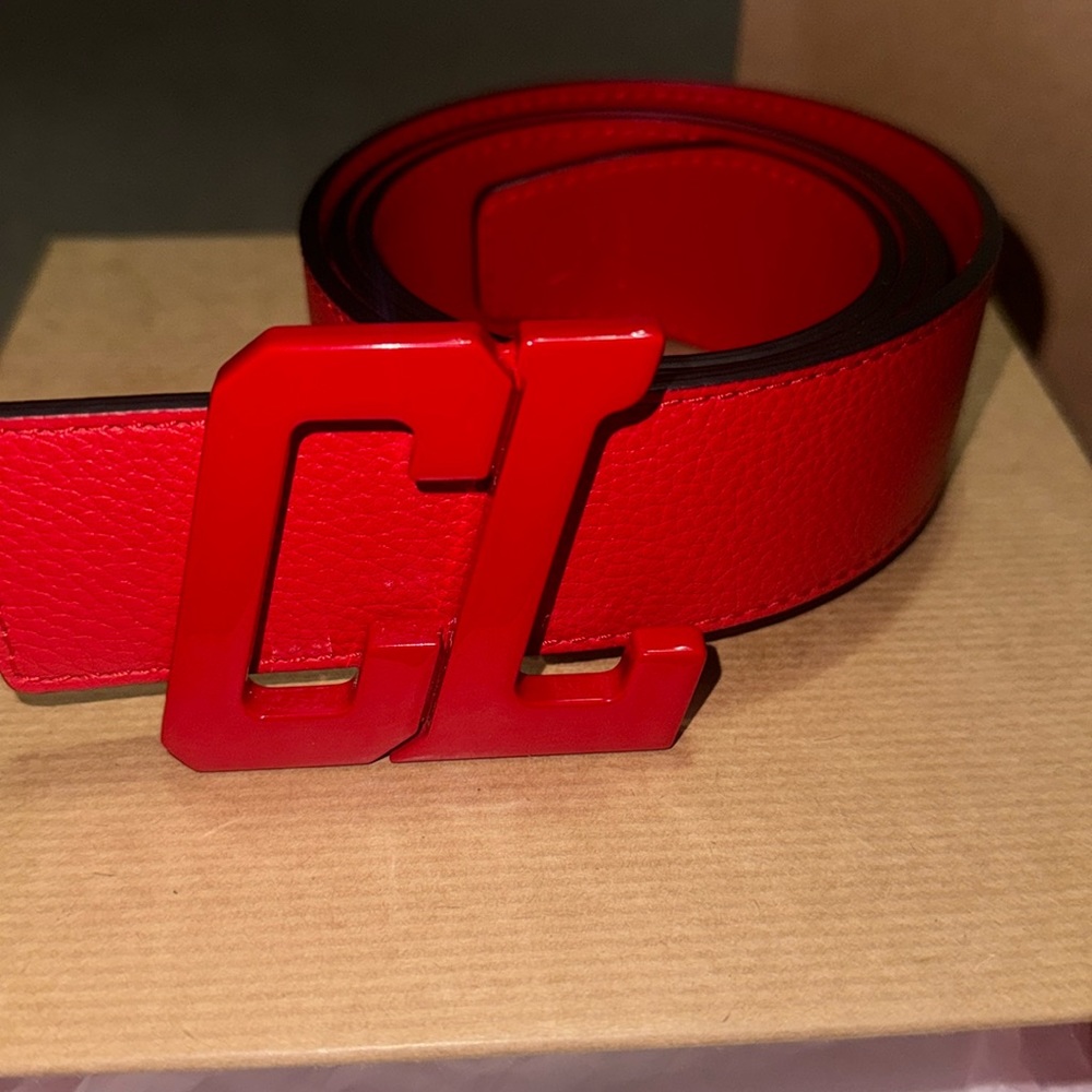 New louboutin  red belt for men original bag and box everything never use.